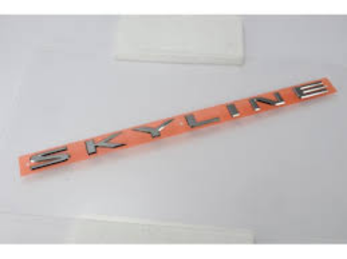 Genuine NISSAN OEM SKYLINE R34 Trunk Lid Emblem "SKYLINE" 84895-AA100