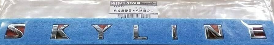 Genuine Nissan OEM R34 Skyline Emblem Badge GTT Rear Trunk Lid Car  84895-AB000